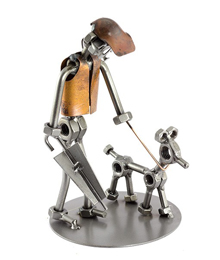 A photo of a Steelman with a dog metal art figurine